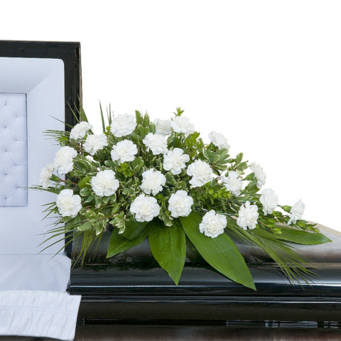 PEACEFUL IN WHITE CASKET SPRAY