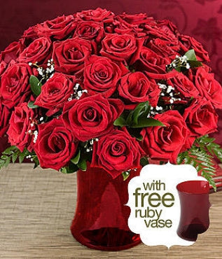 THREE DOZEN LONG STEMMED RED ROSES